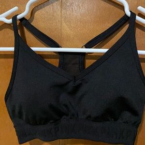 black xs vs pink sports bra lightly lined